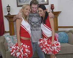 Two sexy cheerleaders double team a hard cock here